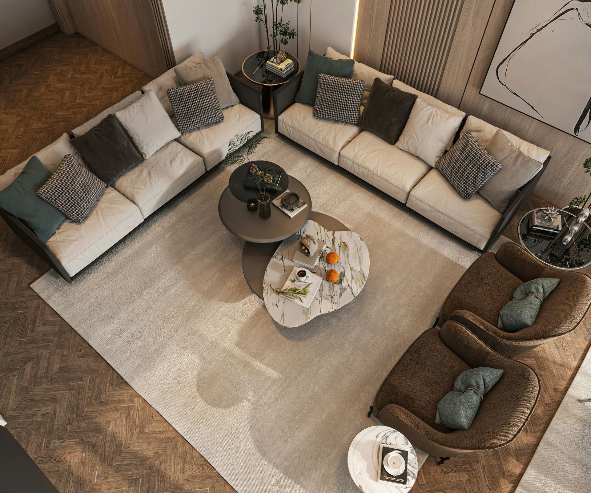 Top-down view of a cozy living room with an L-shaped sofa, two brown chairs, and layered coffee tables.