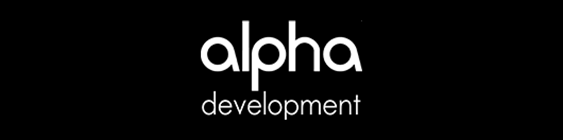 The alpha development logo is on a black background