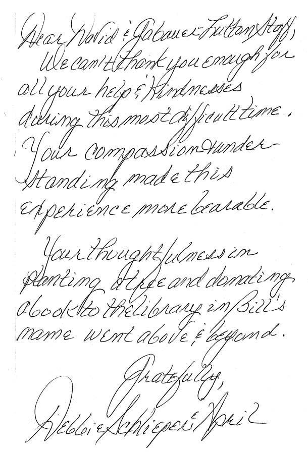 Handwritten note on lined paper with cursive black ink, signed at the bottom.