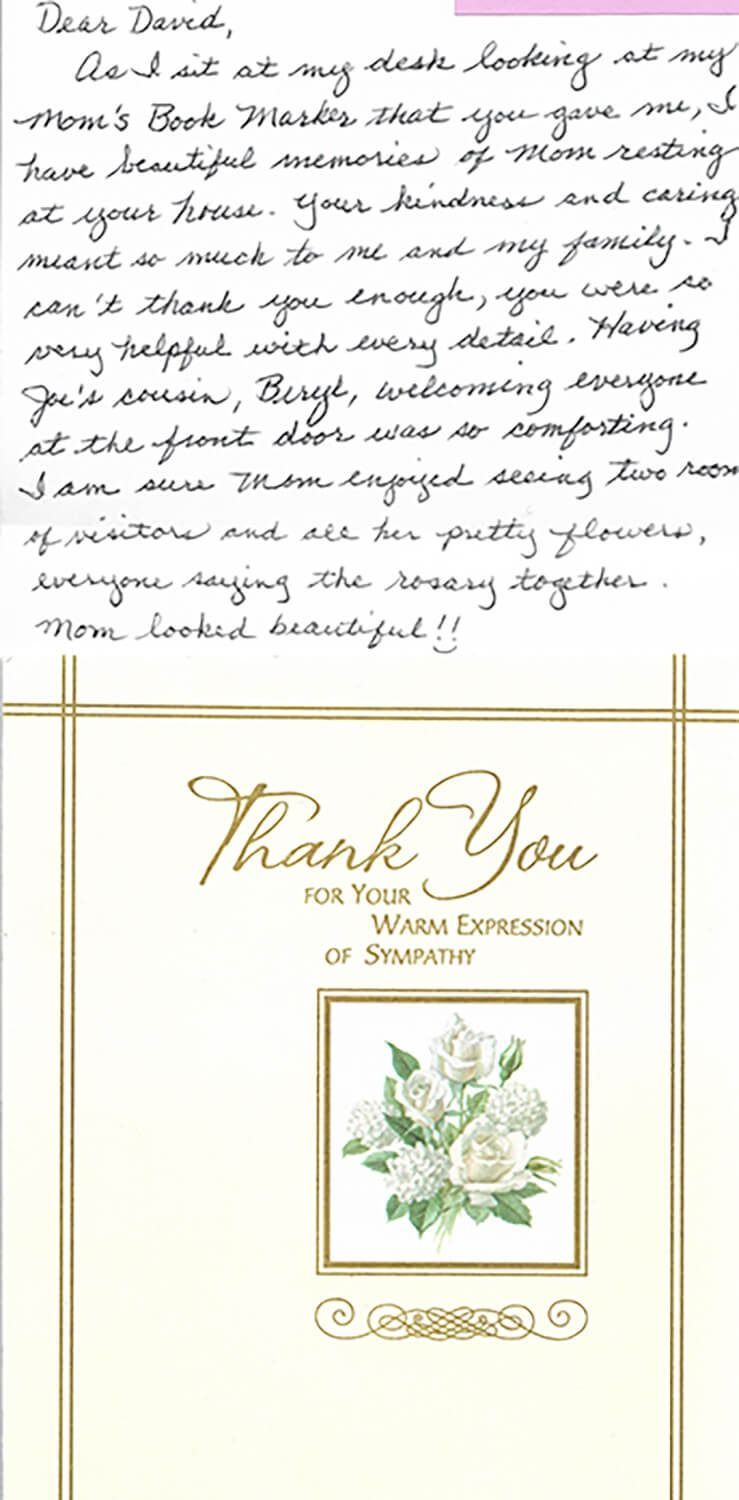 Handwritten thank-you note above a gold-bordered floral “Thank You” card on a white background