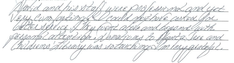 Handwritten cursive note on lined paper, lightly written in pencil.