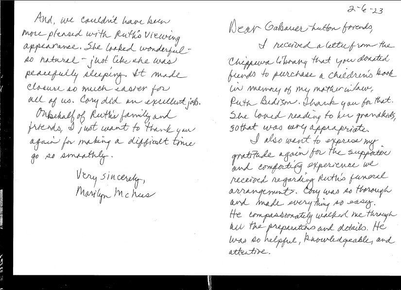 Open notebook page with handwritten notes in black ink on white paper.
