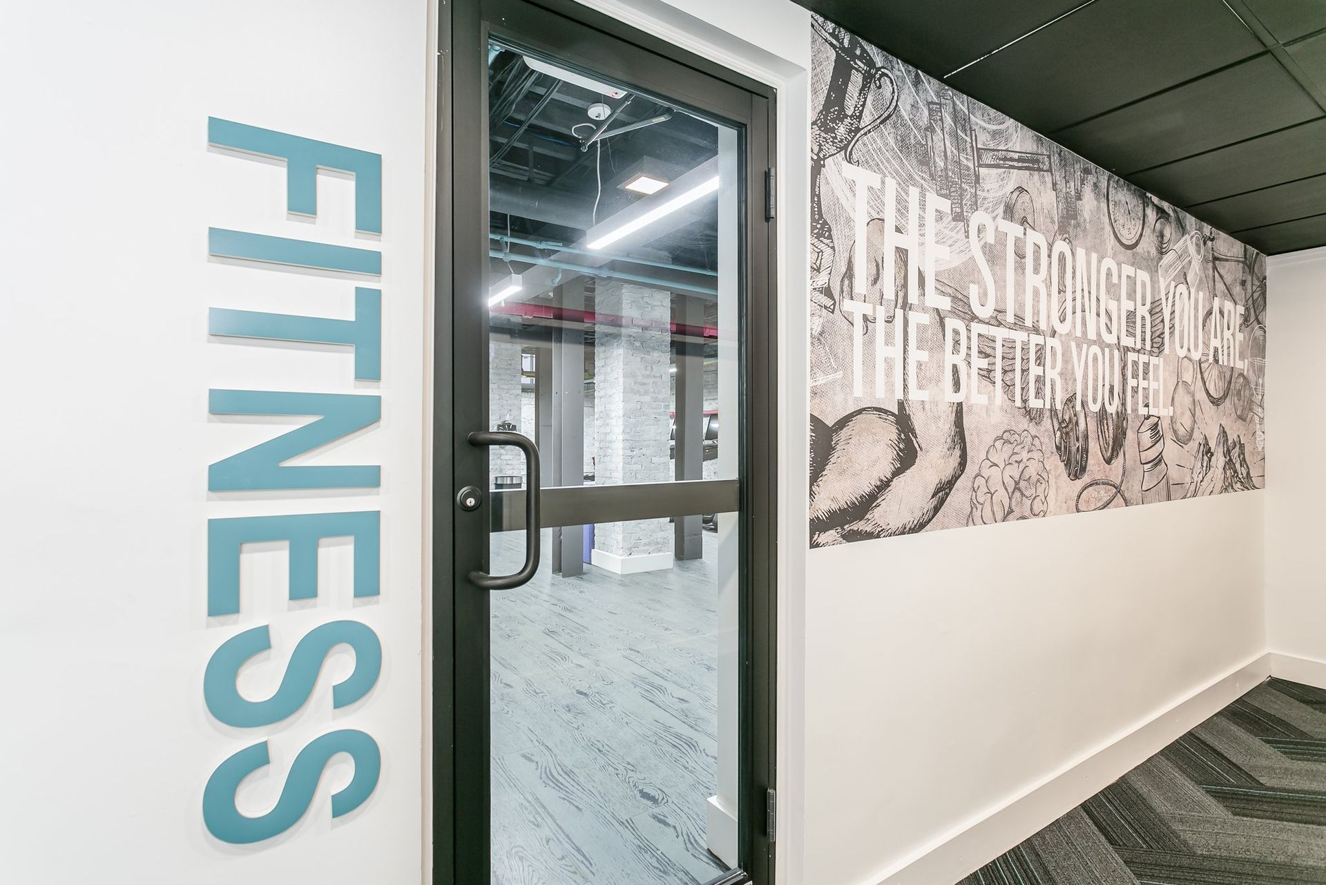 Door into Normandie Apartments fitness center