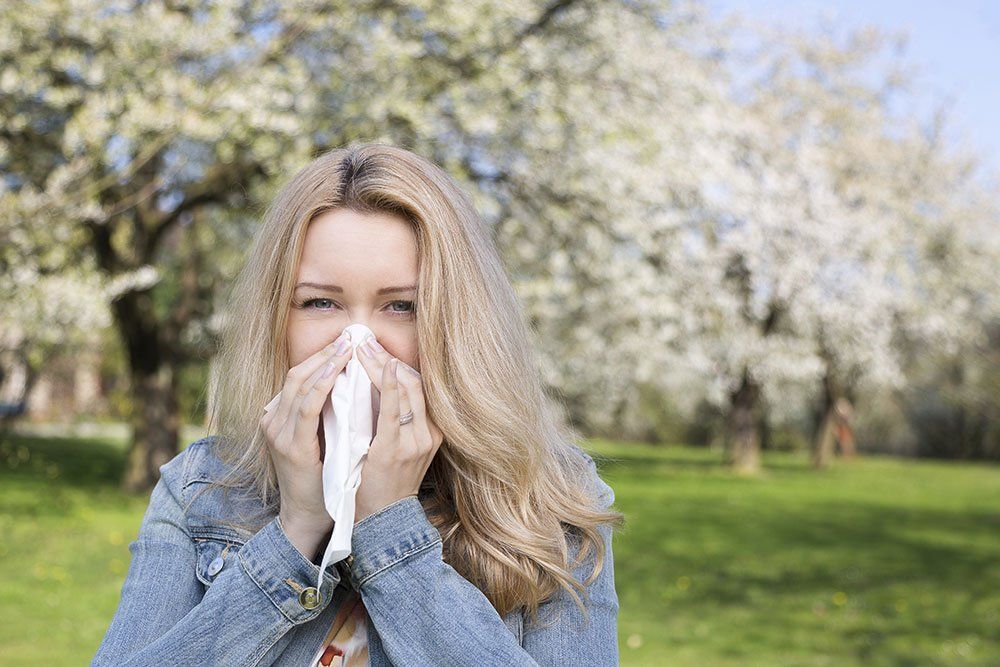 girl sneezing