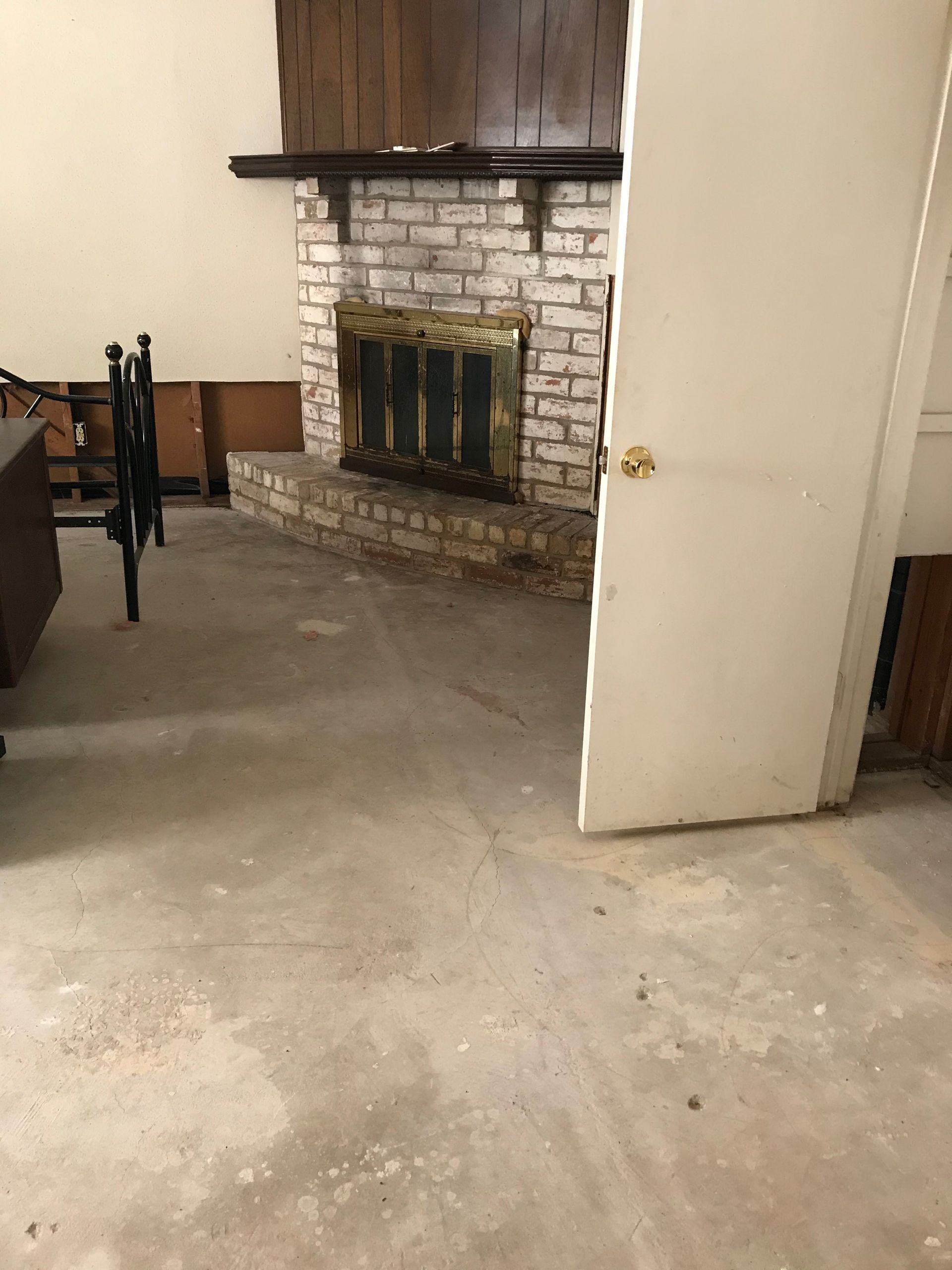 There is a fireplace in the middle of the room.