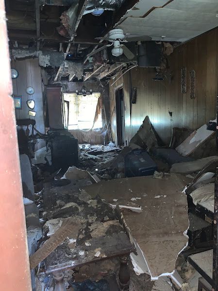 A room in a house that has been damaged by a fire.