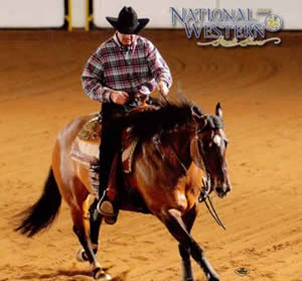 Cowboy in plaid riding a brown horse in an indoor arena, with a National Western logo in the corner
