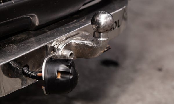 A Close Up Of A Tow Hook On The Back Of A Car — Tamworth Muffler Man In Tamworth, NSW