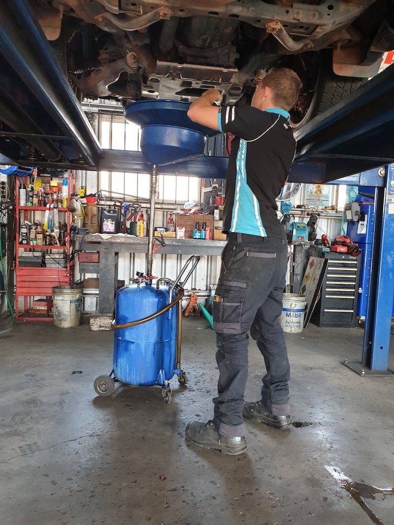 Technician Checking the Engine — Mechanic in Atherton, QLD
