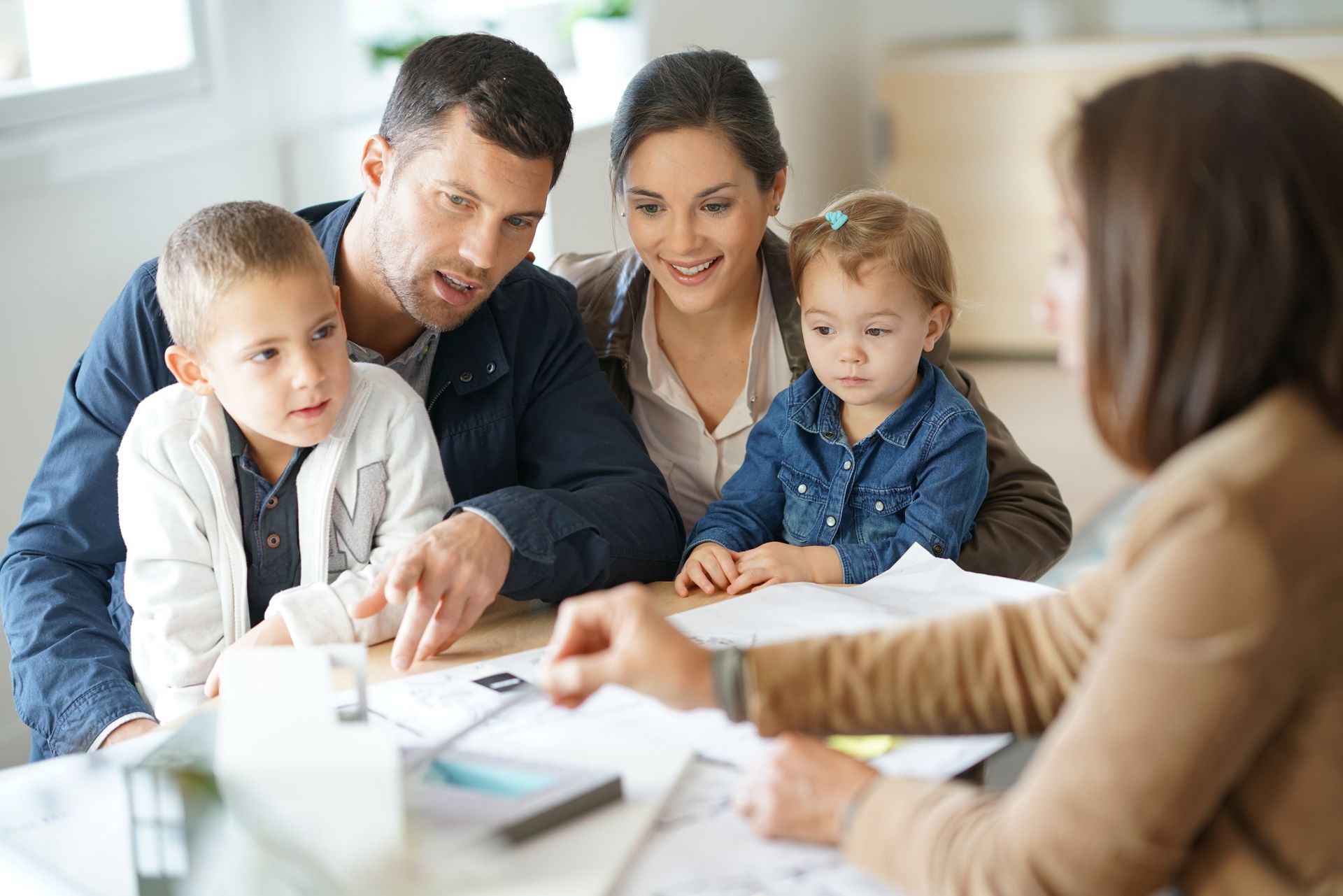 Hudson Valley family in attorney waiting area considering estate planning
