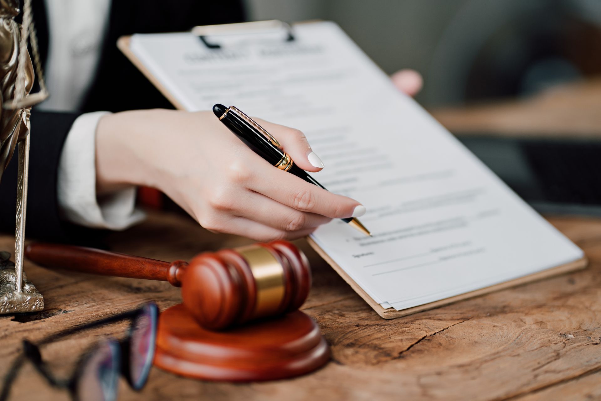 Estate planning attorney reviewing will and trust documents with client