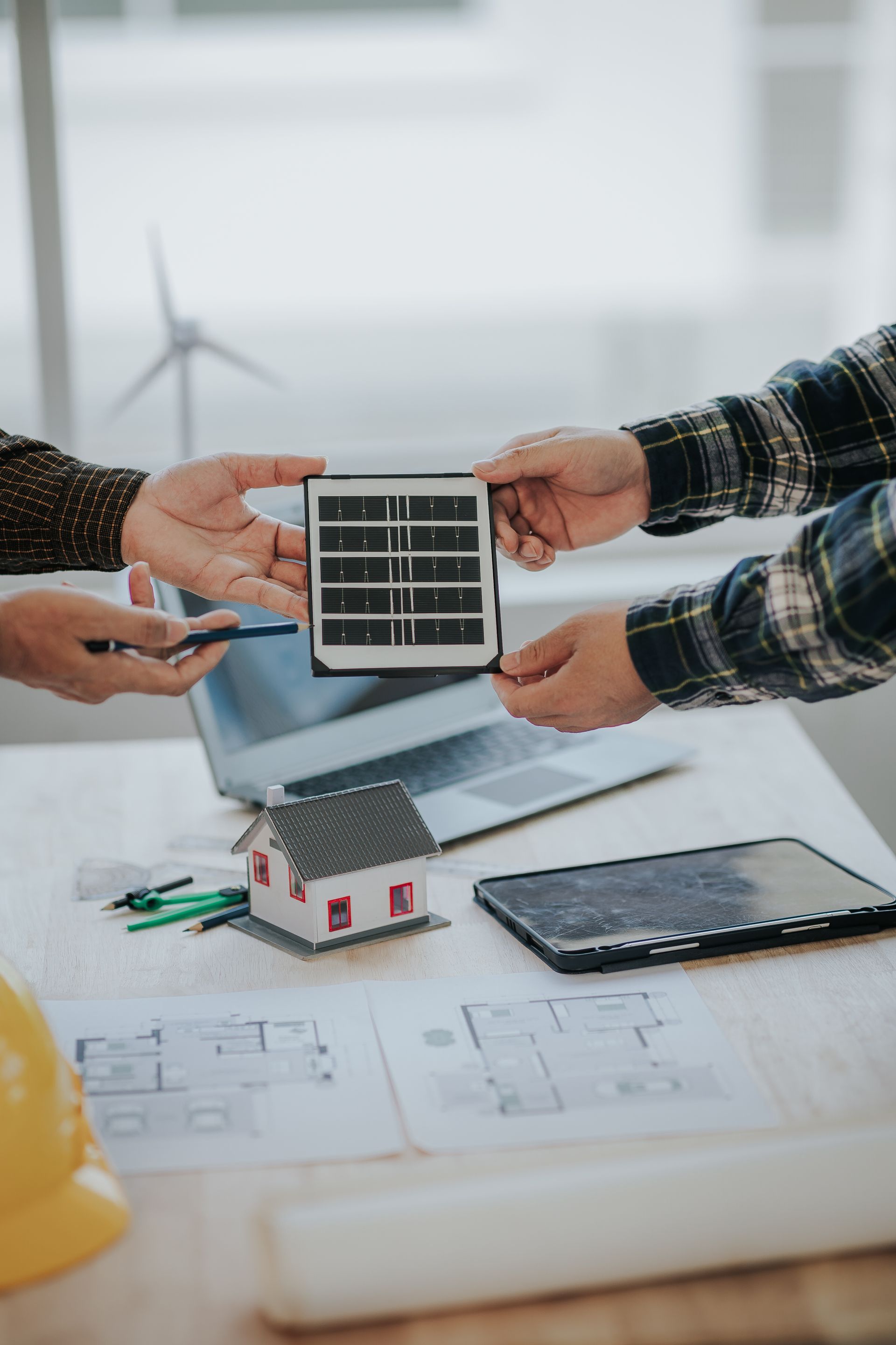 Attorney Dana Ware reviewing a solar energy contract at Hudson Legacy Law's Walden NY office.