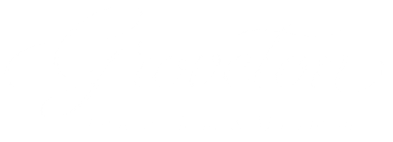 Mostly blank white screen with a small gray arrow cursor near the bottom center.