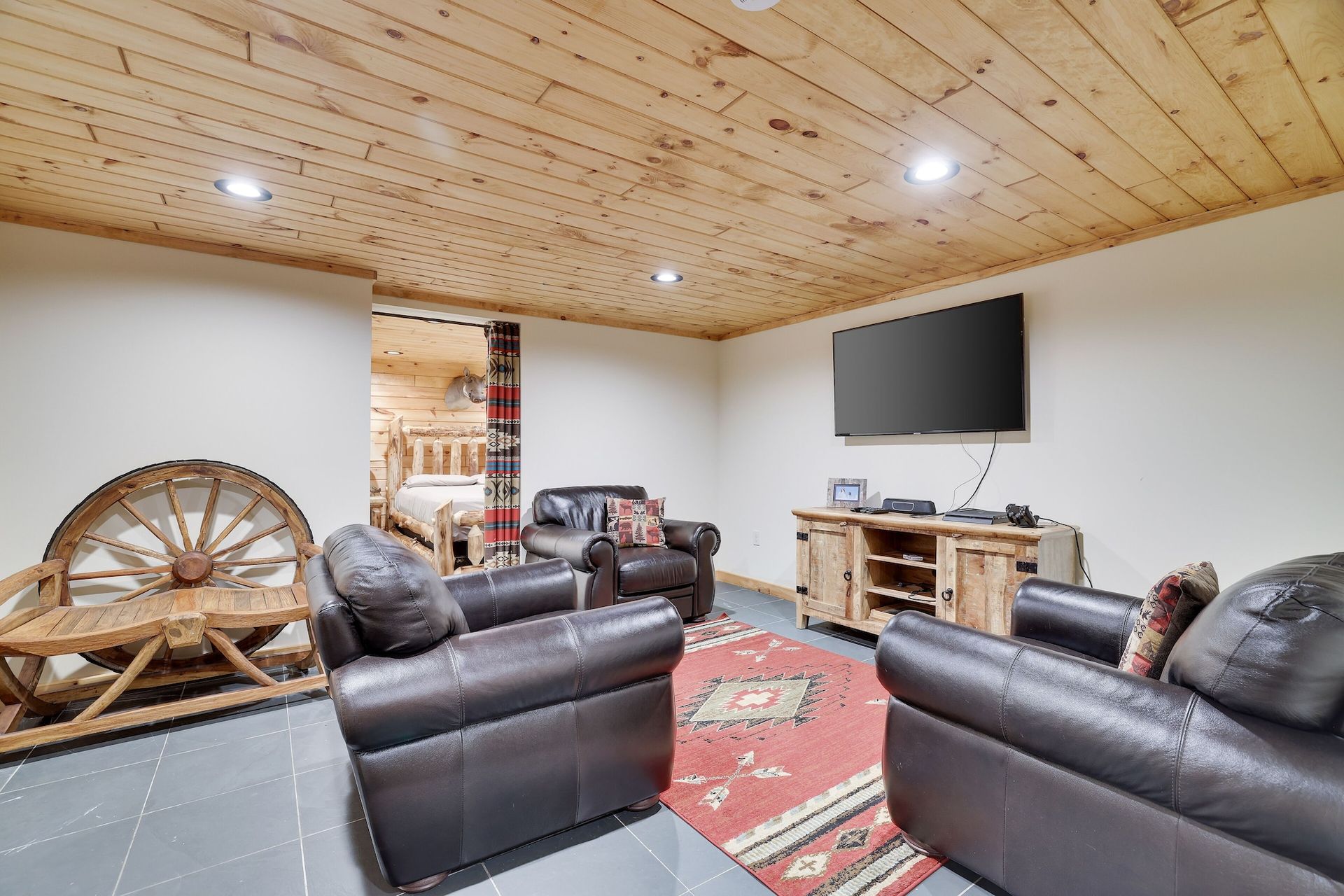 A living room filled with furniture and a flat screen tv.