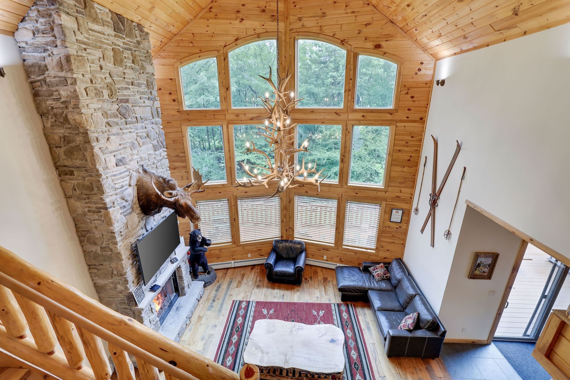 An aerial view of a living room in a log cabin