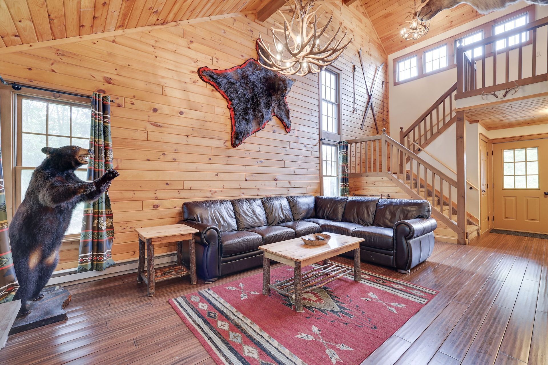 A living room with a couch and a fireplace