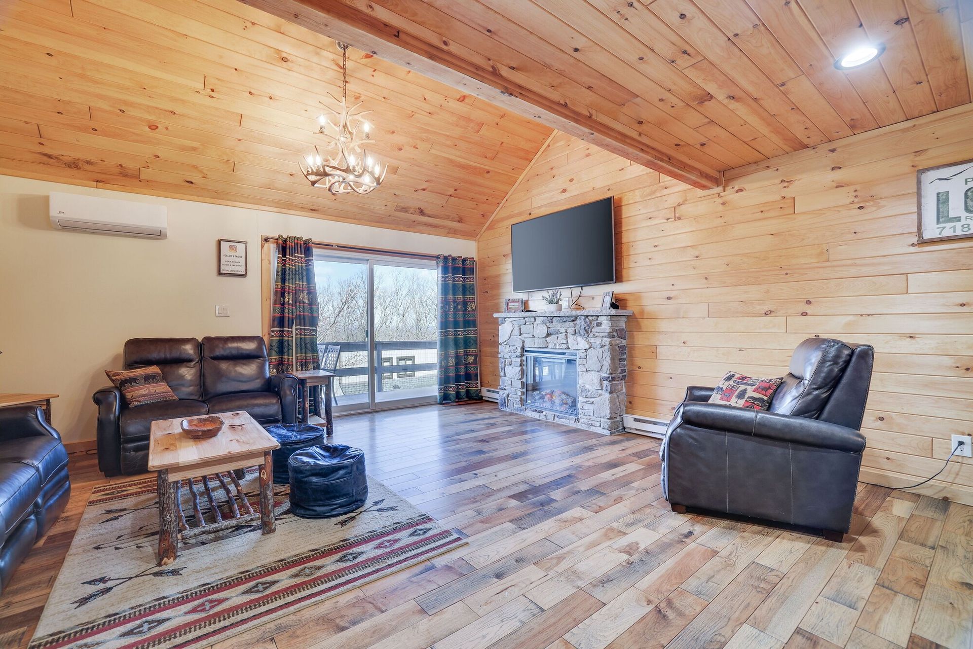 A living room filled with furniture and a fireplace.