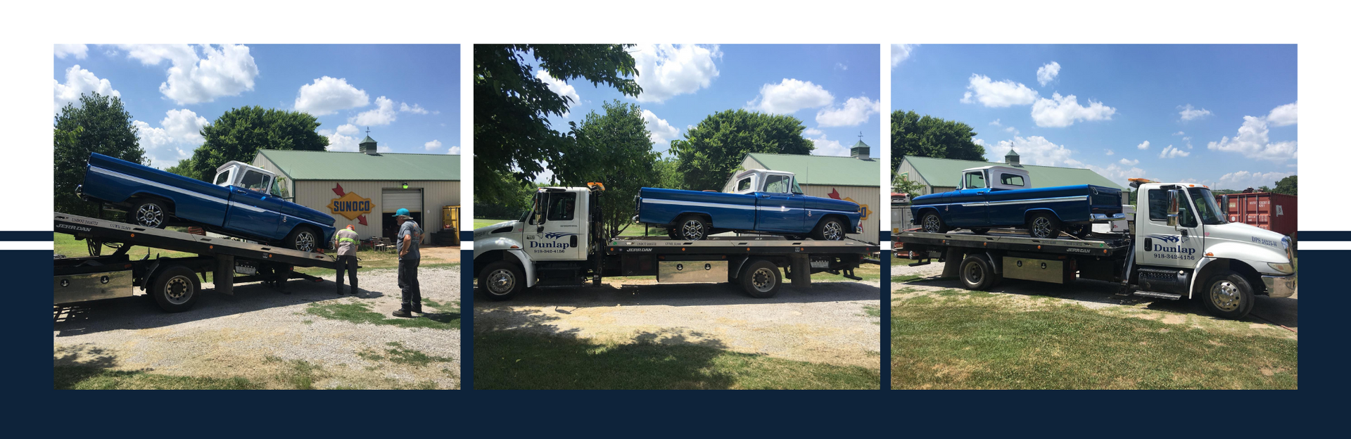 A blue pickup truck being loaded onto a flatbed tow truck in front of a building on a sunny day.