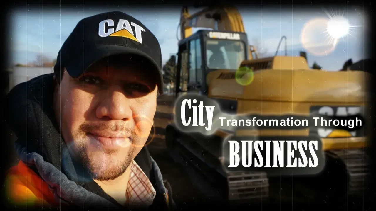 Man in CAT cap beside heavy machinery with text “City Transformation Through BUSINESS”