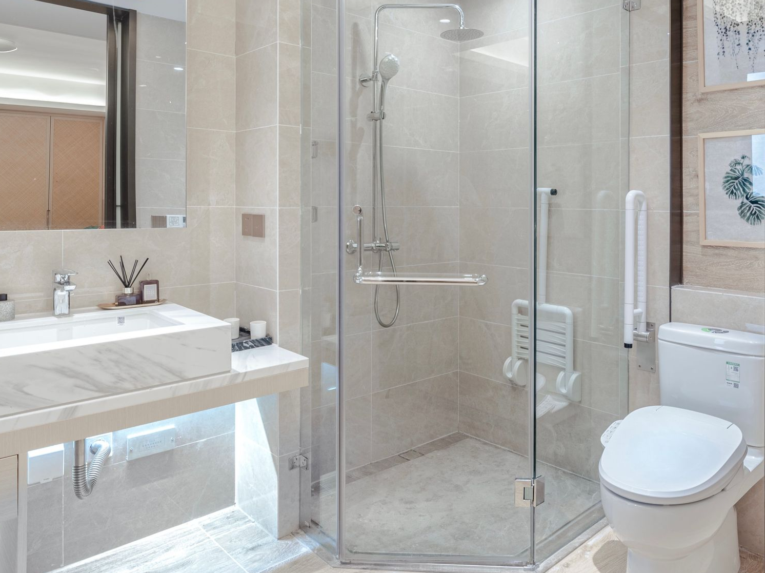 A shower with grab bars and no lip
