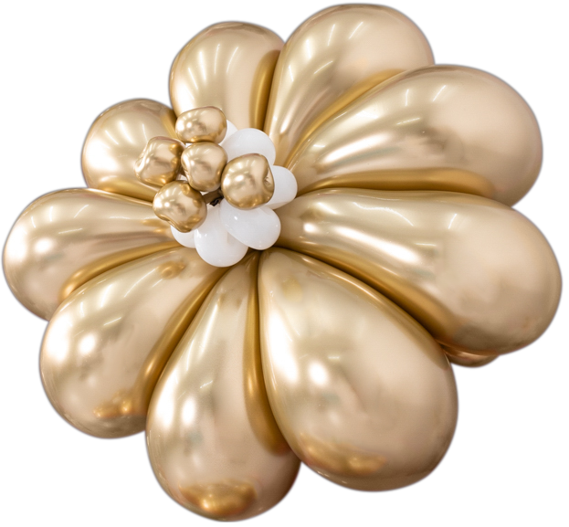 A gold flower made out of balloons on a white background
