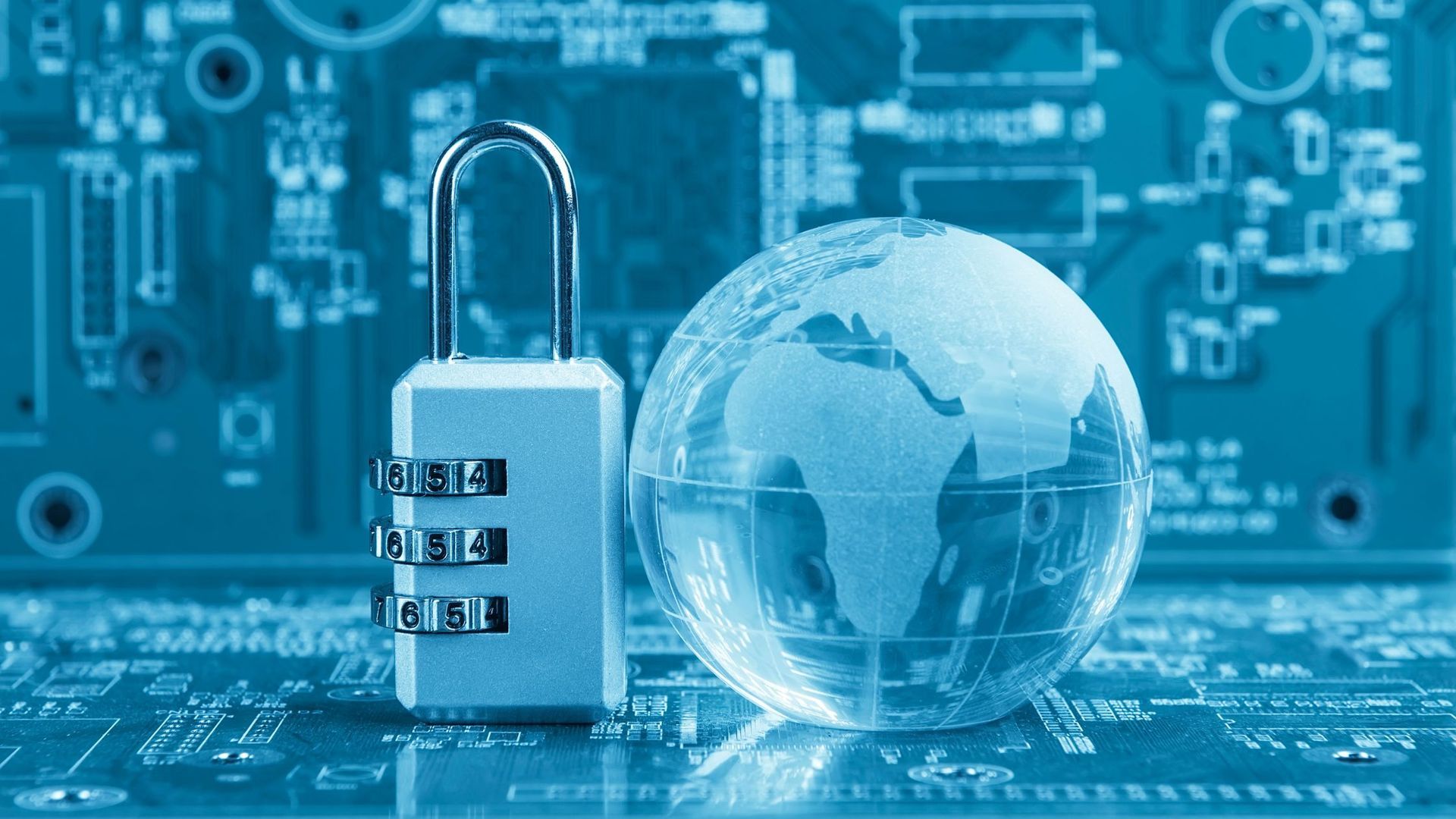 A padlock and a globe are on a computer screen.
