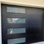 Dark garage door with four narrow frosted glass windows