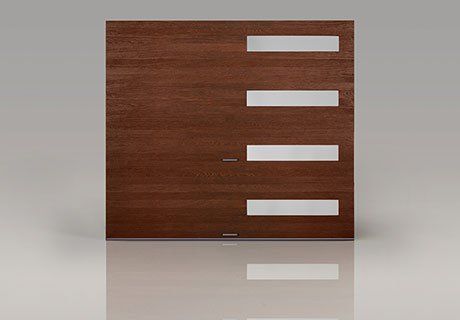 Wooden panel with four horizontal white rectangular slots on a reflective surface.