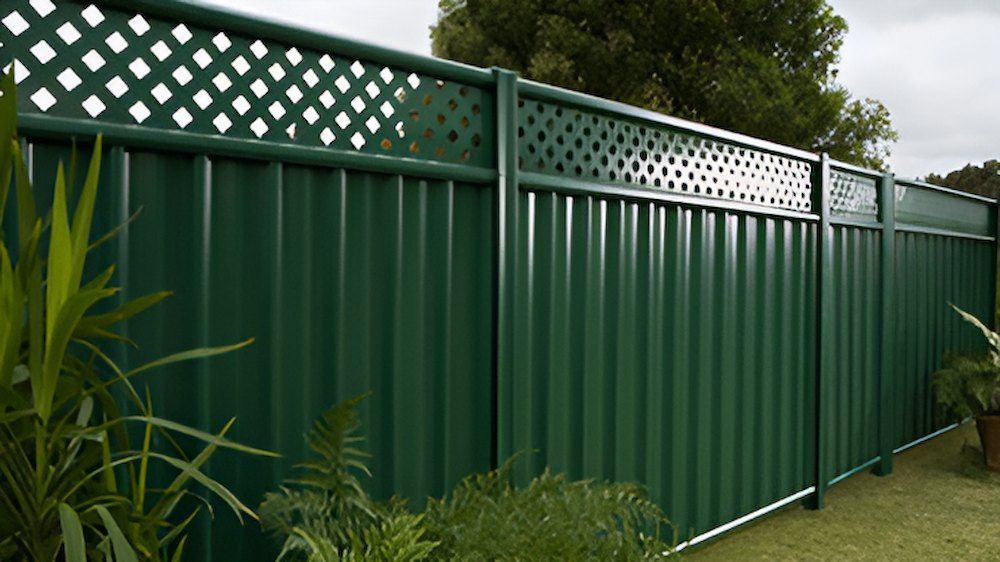 A Green Fence With a White Lattice on the Top — Downright Carpentry in Ryan, QLD