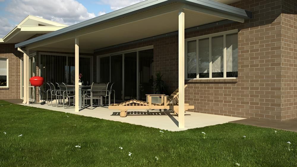 A Brick House With a Covered Patio With Chairs and a Grill — Downright Carpentry in Pioneer, QLD