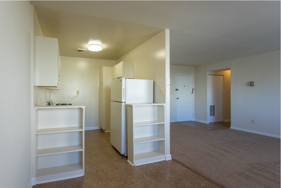 Kitchen with refrigerator