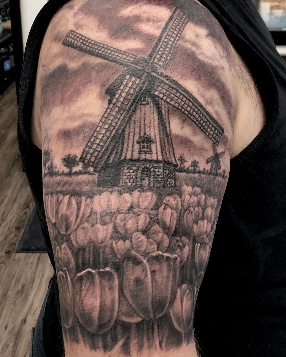 Windmill and Tulips Tattoo by Steve Hayes at Black Gold Tattoo Co in Edmonton Alberta Canada
