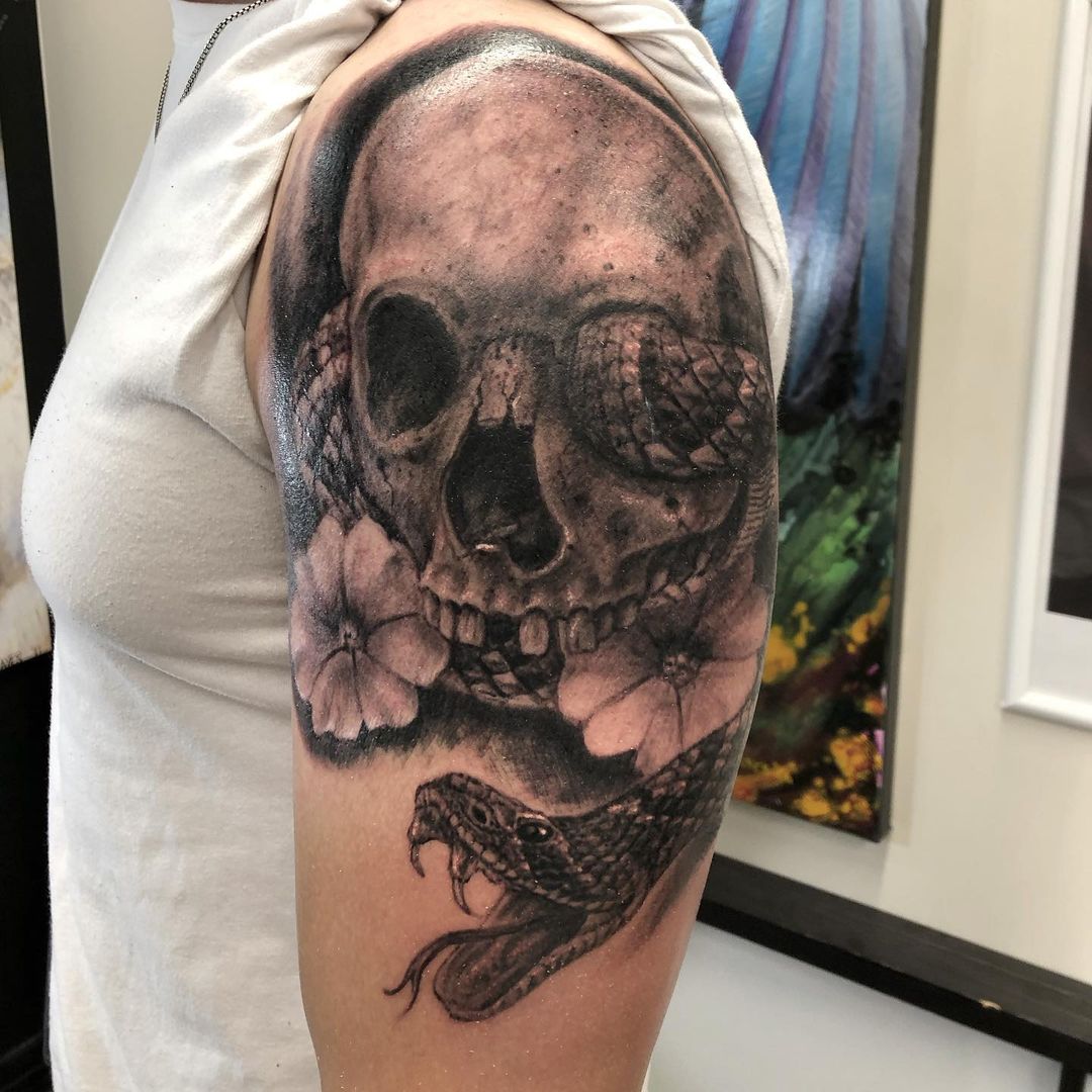 Skull and Snake Tattoo by Steve Hayes at Black Gold Tattoo Co in Edmonton Alberta Canada