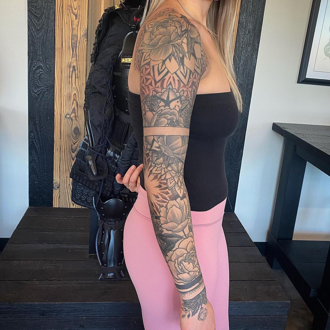 Geometric and Floral Sleeve by Dale Moostoos at Crimson Empire Tattoo in Edmonton Alberta Canada