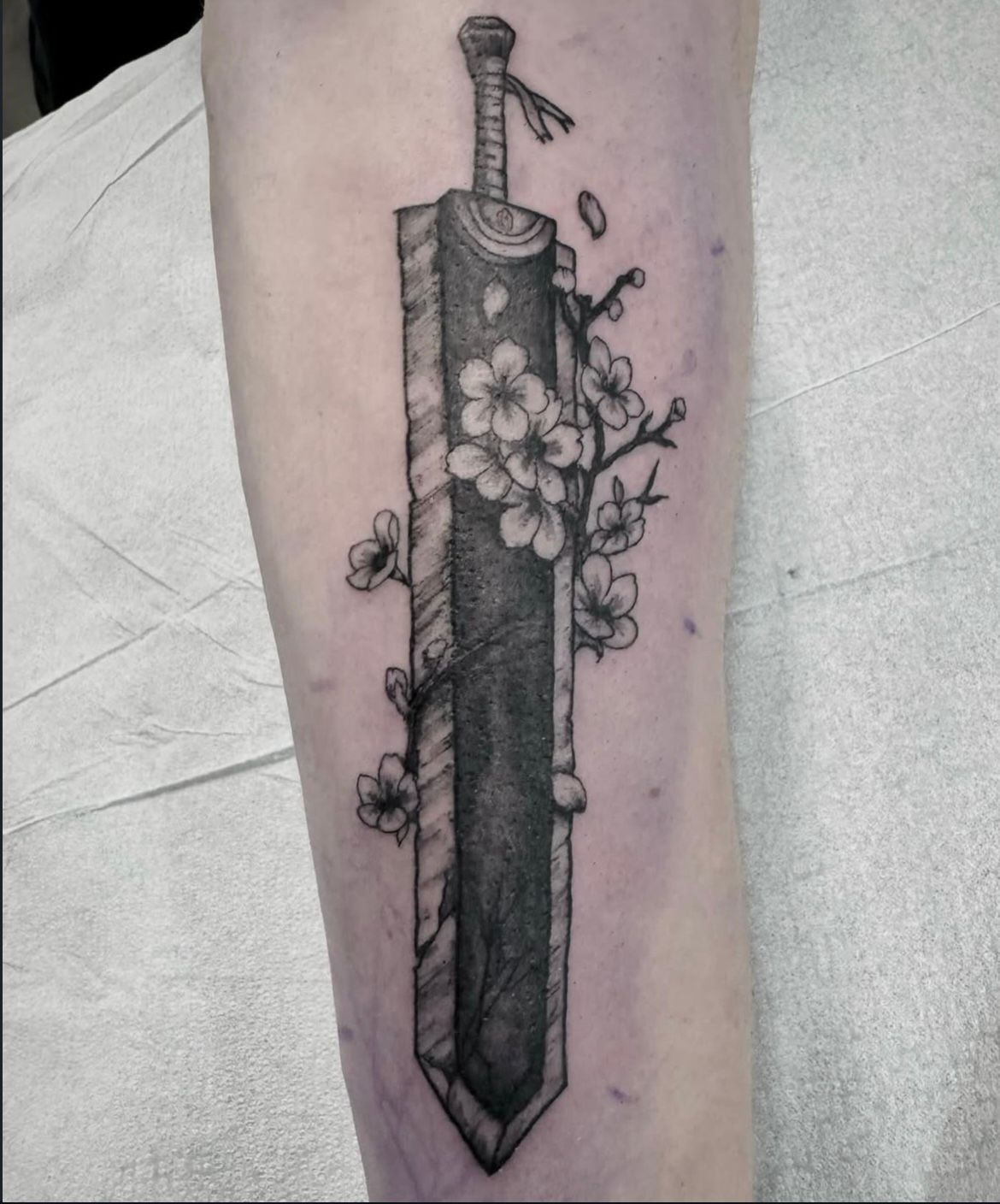 Guts Dragon Slayer Sword Tattoo by Vinny Nguyen at Crimson Empire Tattoo in Edmonton Alberta Canada
