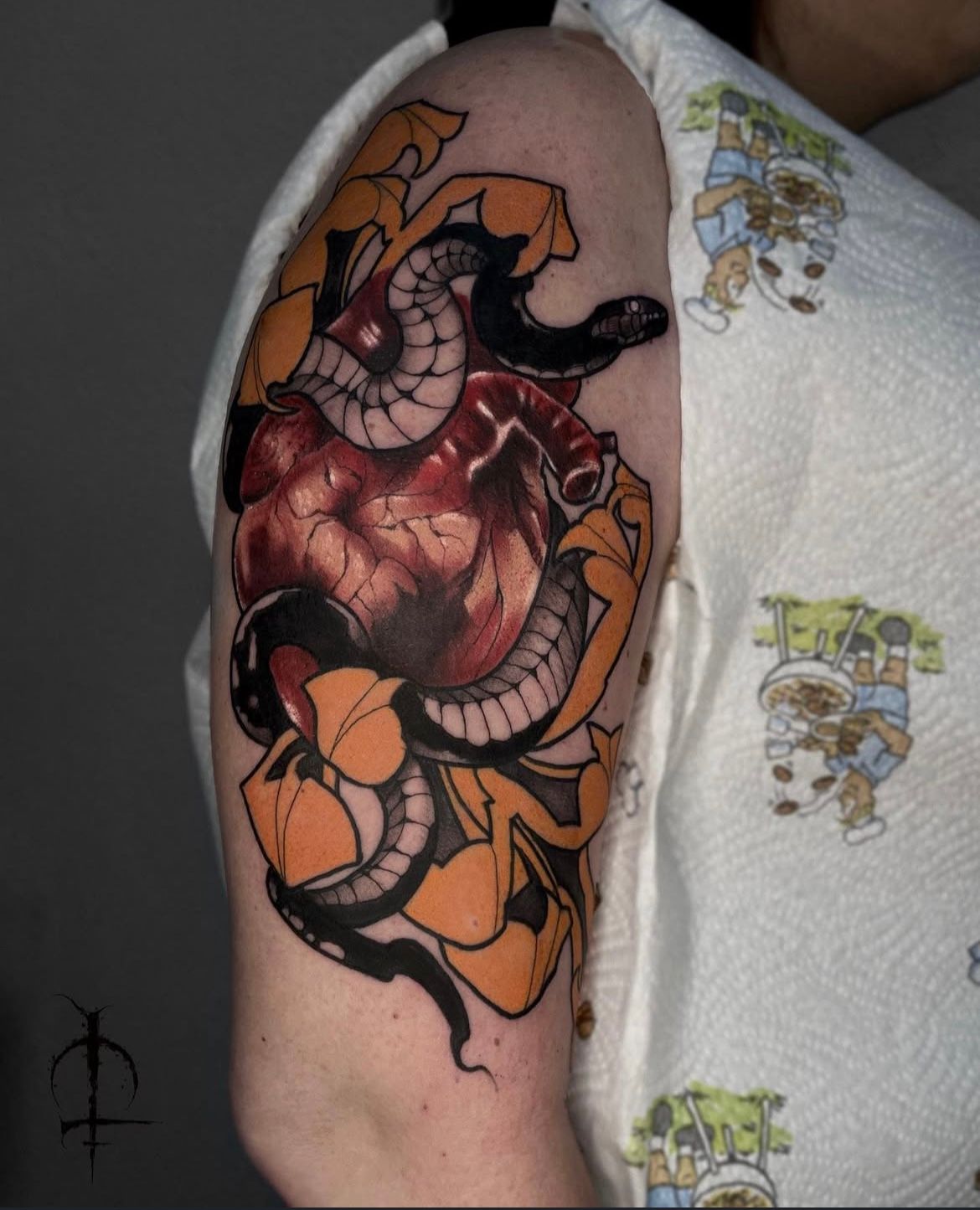 Anatomical Heart and Floral Tattoo by Val at Silver Ghost Tattoo in Edmonton Alberta Canada