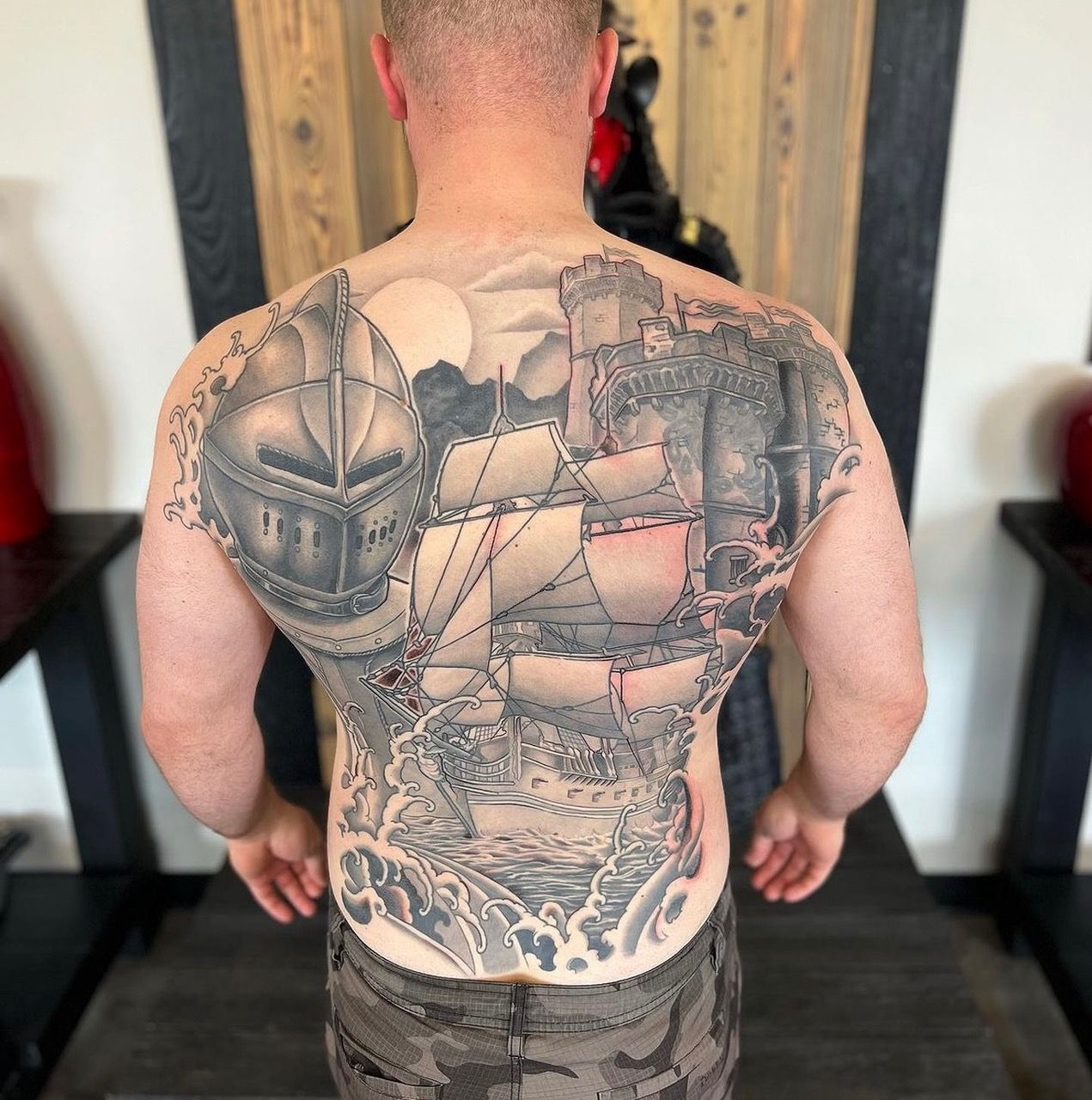 Ship, Castle and Knight Backpiece Curt Semeniuk at Crimson Empire Tattoo in Edmonton Alberta Canada