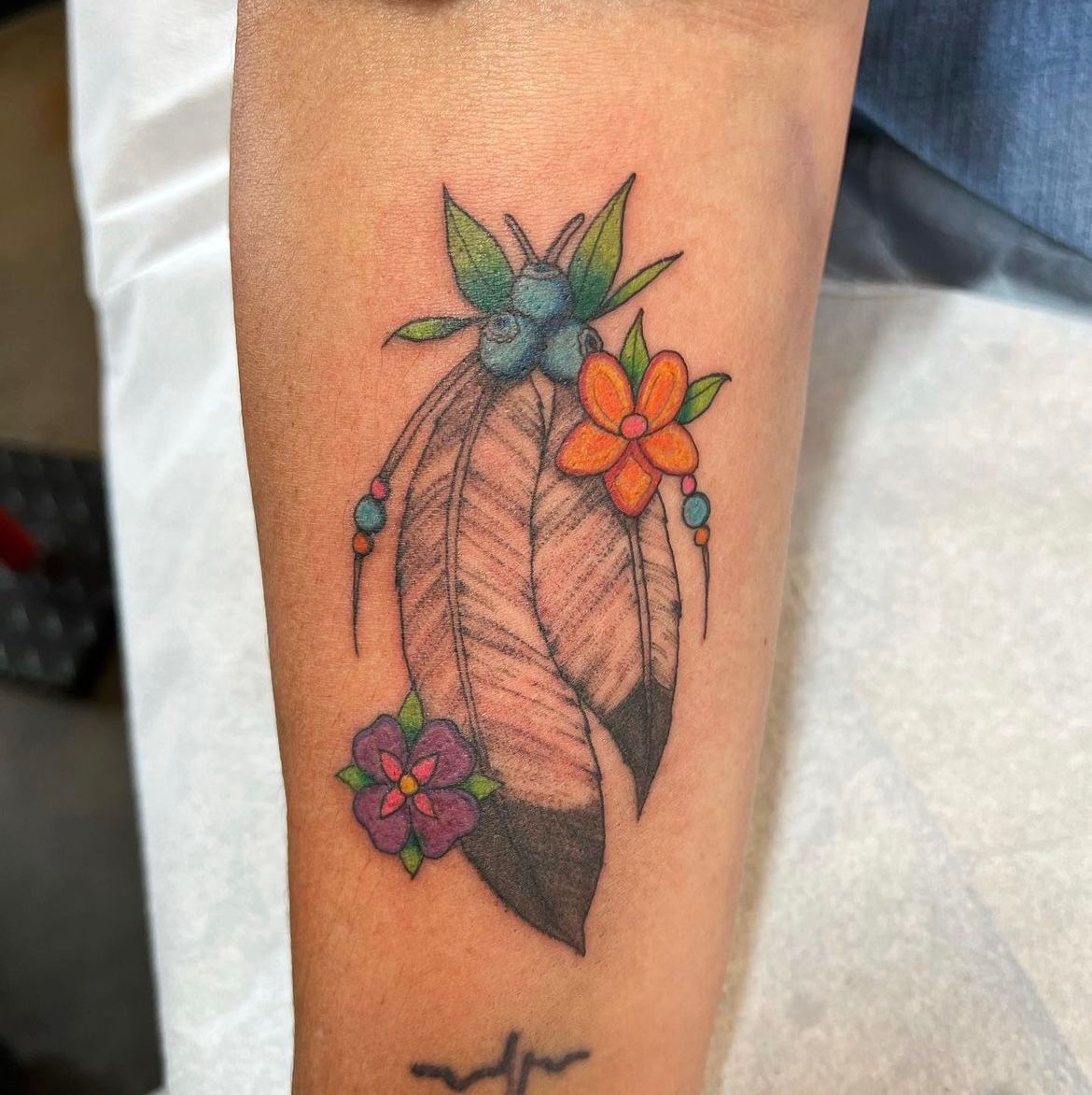 Feathers, Flowers and Blueberries Tattoo by Vinny Nguyen at Crimson Empire Tattoo in Edmonton Alberta Canada