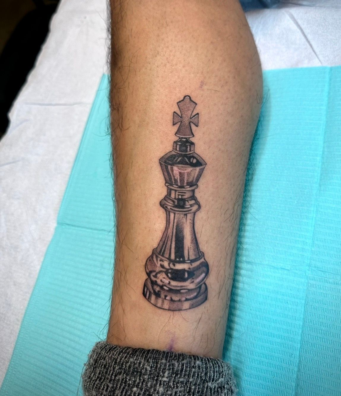 Chess Piece Tattoo by Fran Arceta at Crimson Empire Tattoo in Edmonton Alberta Canada
