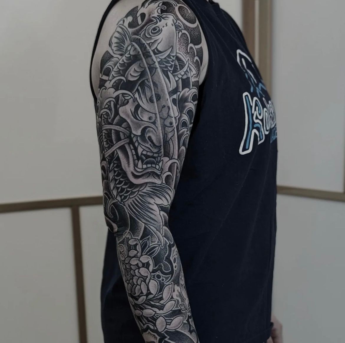 Hannya, Koi, and Chrysanthemum Sleeve by Chris Benson at Silver Ghost Tattoo in Edmonton Alberta Canada