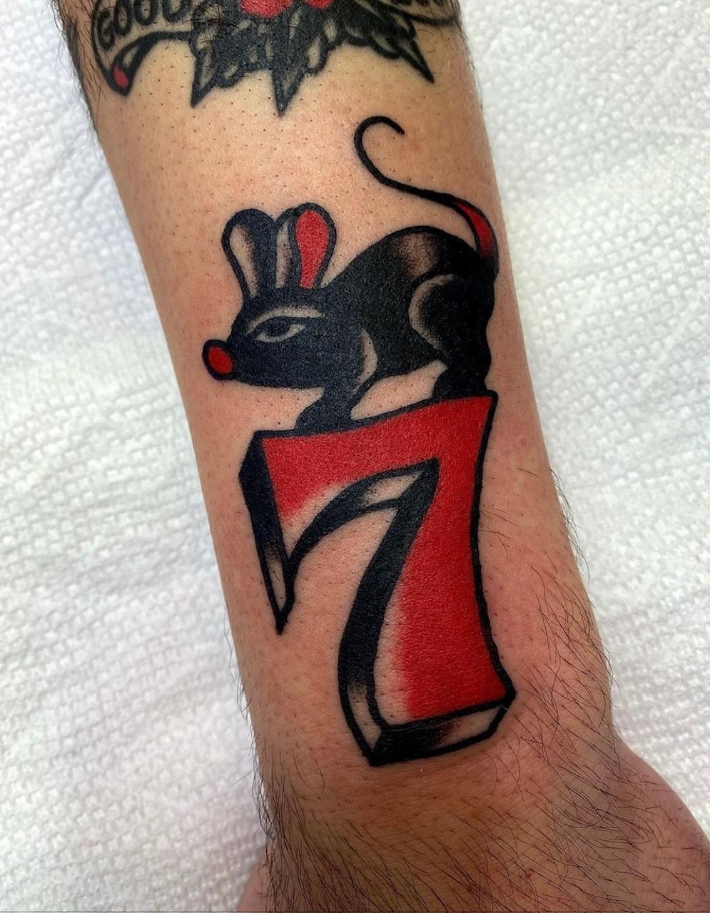 Mouse Tattoo by JD Pezderic at Silver Ghost Tattoo in Edmonton Alberta Canada