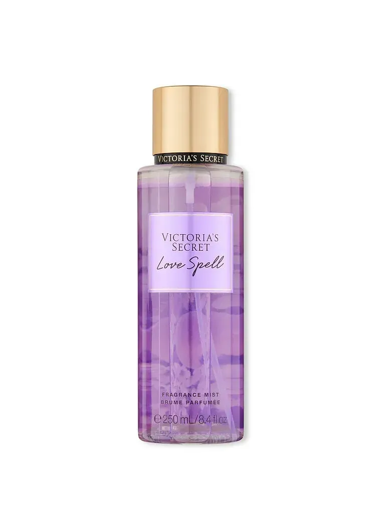 Frasco de bruma corporal Love Spell de Victoria's Secret color morado con tapa dorada.