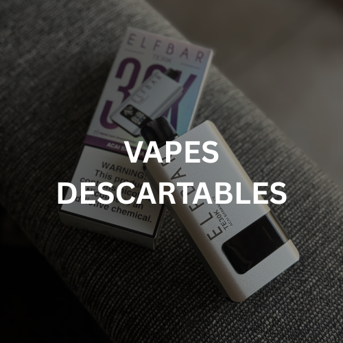 Vape desechable de color blanco y caja sobre superficie gris con el texto 