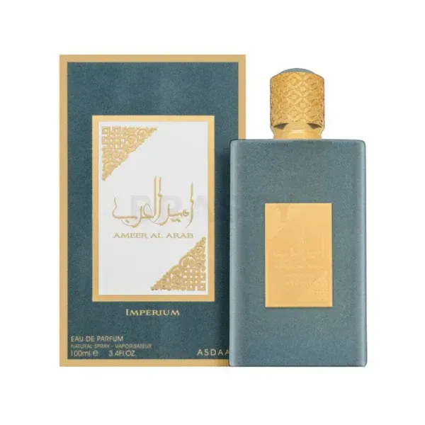 Frasco de perfume árabe de color verde azulado y dorado con caja a juego sobre fondo blanco.
