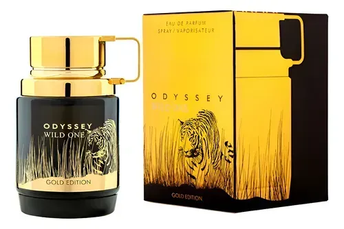 Frasco dorado y caja negra del perfume Odyssey Wild Zone sobre un fondo blanco.
