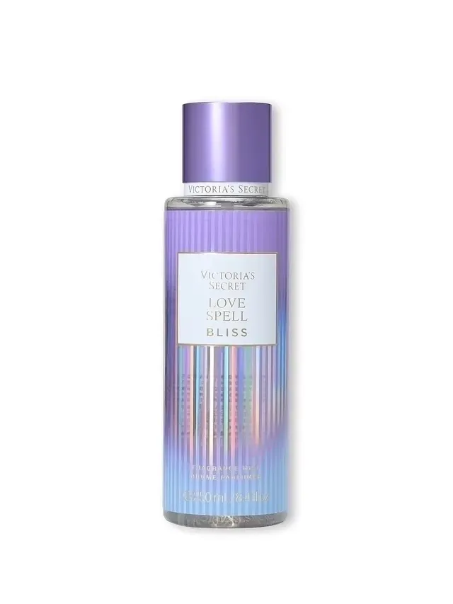 Frasco morado de la loción Pearl Bliss de Wilson con etiqueta iridiscente.
