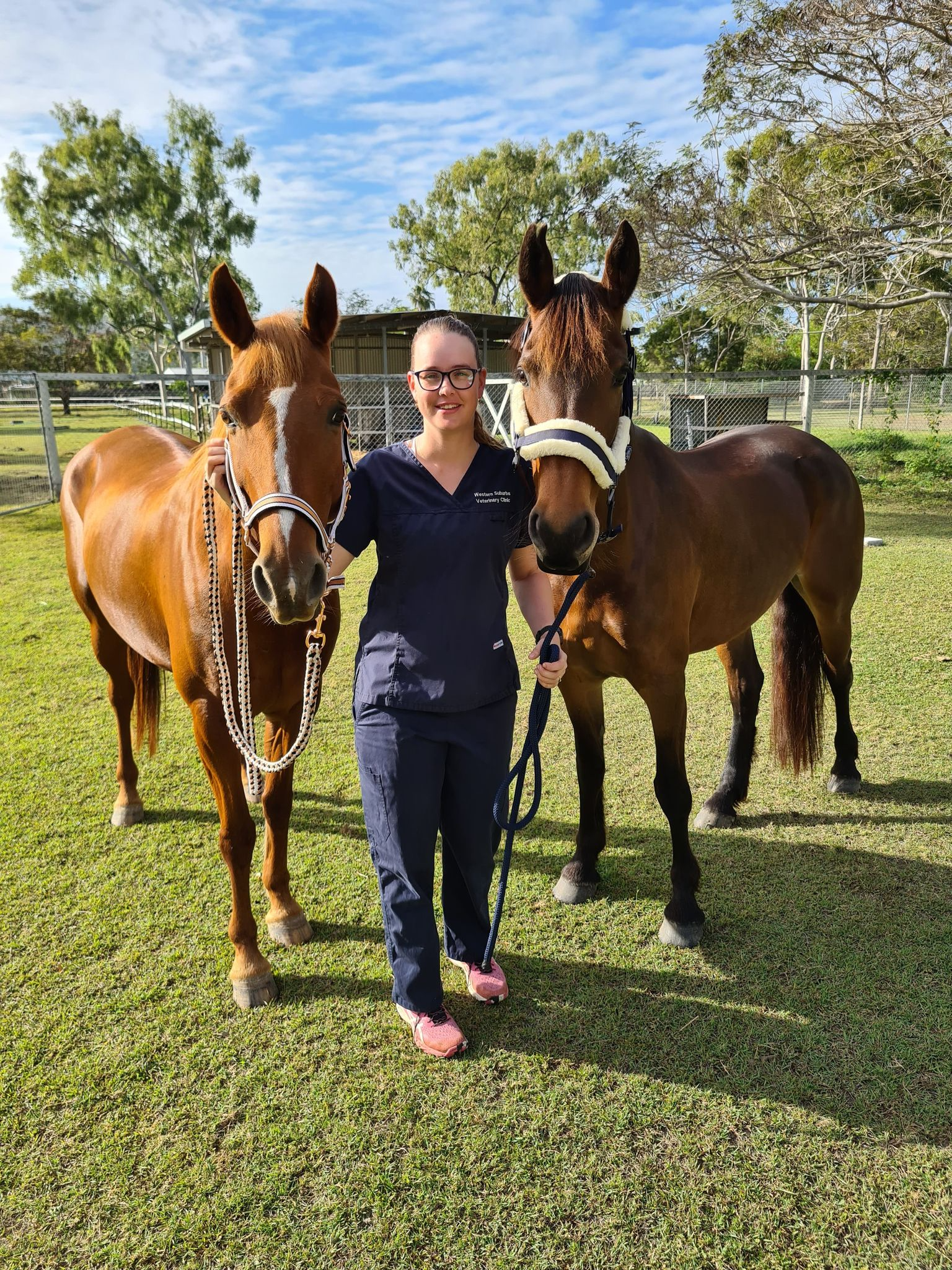 Dr Anita Horton with two horses