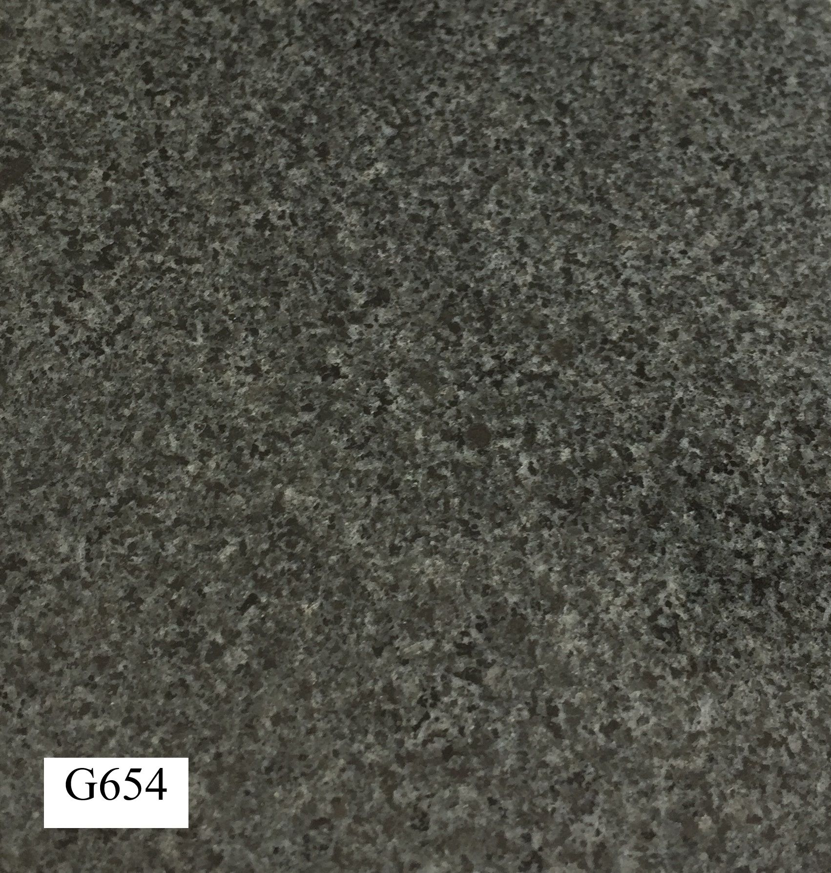 Dark Gray Granite Surface With Speckled Texture; Labelled G654 — Mid Coast Monuments In Wauchope, NSW