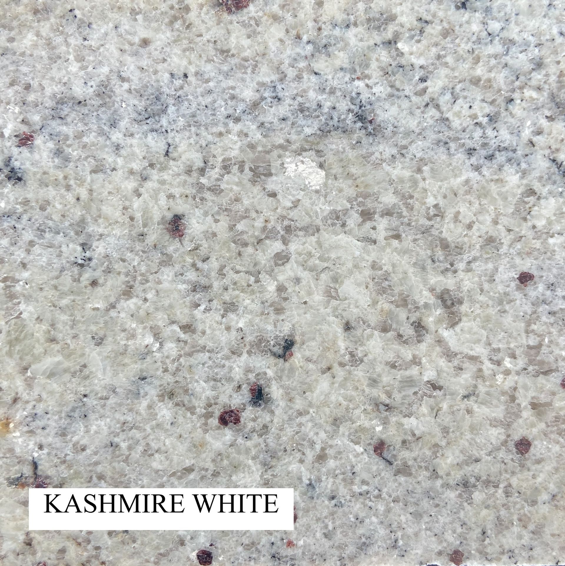 Kashmire White Granite Stone Surface, Speckled With Gray — Mid Coast Monuments In Wauchope, NSW