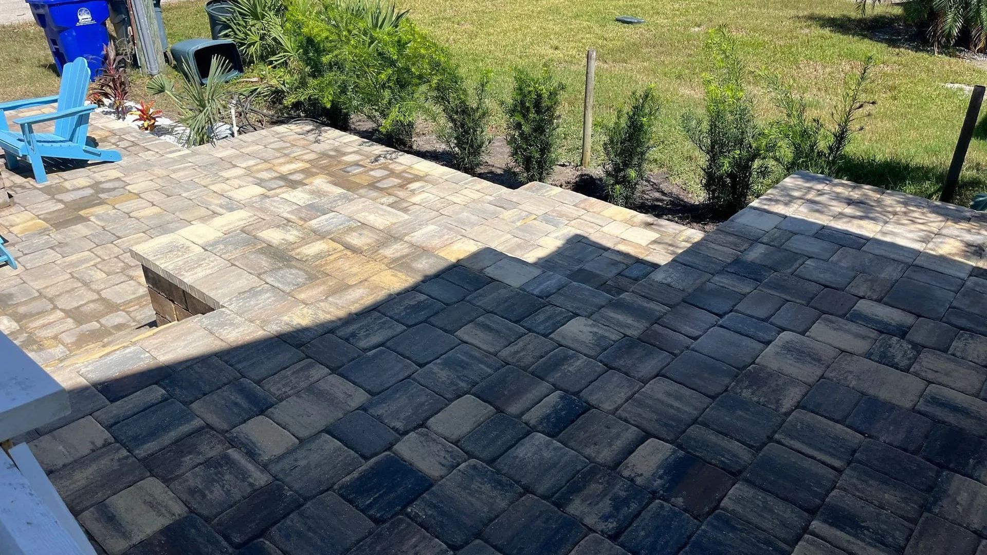 New paver driveway installed by St. Johns Pavers in Florida, designed to handle heat, heavy rain, an